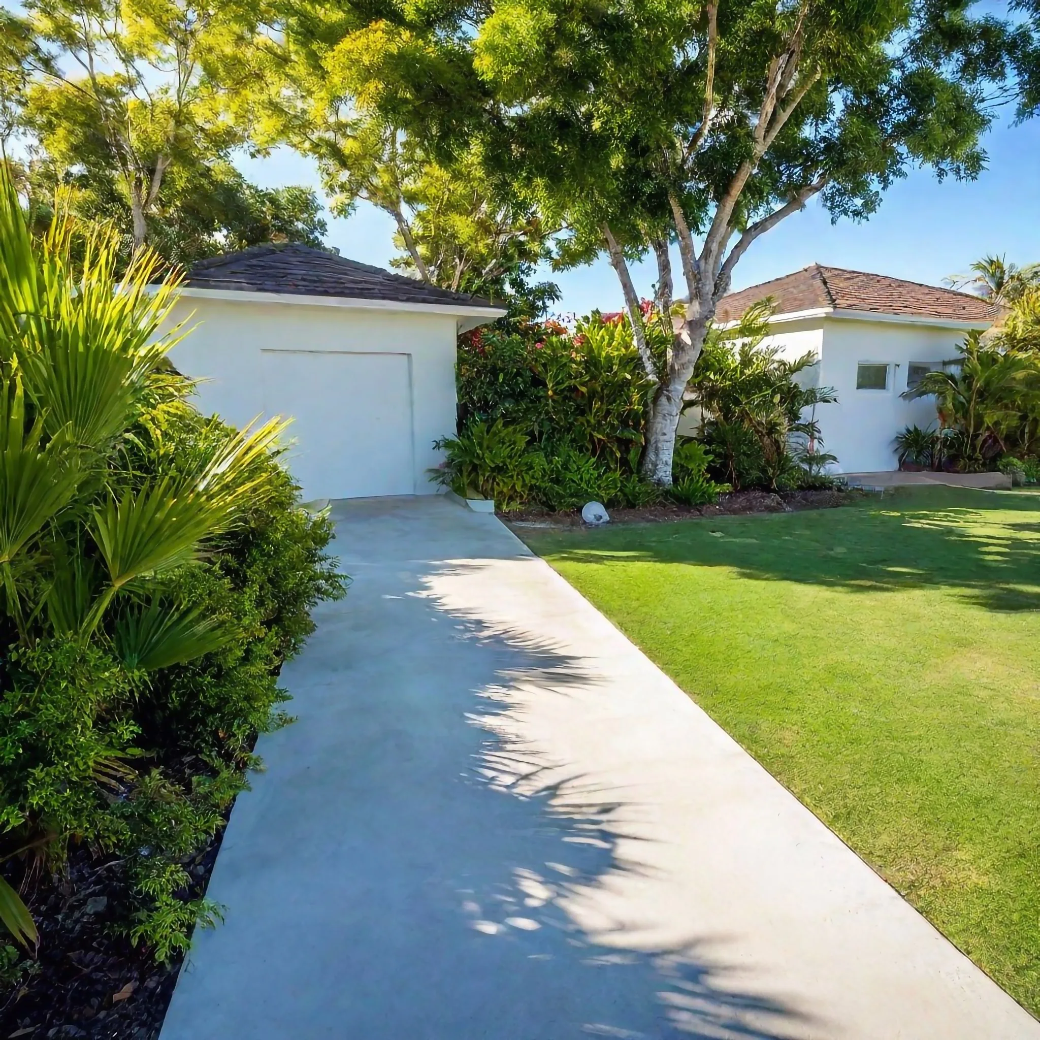 A concrete pathway around a property