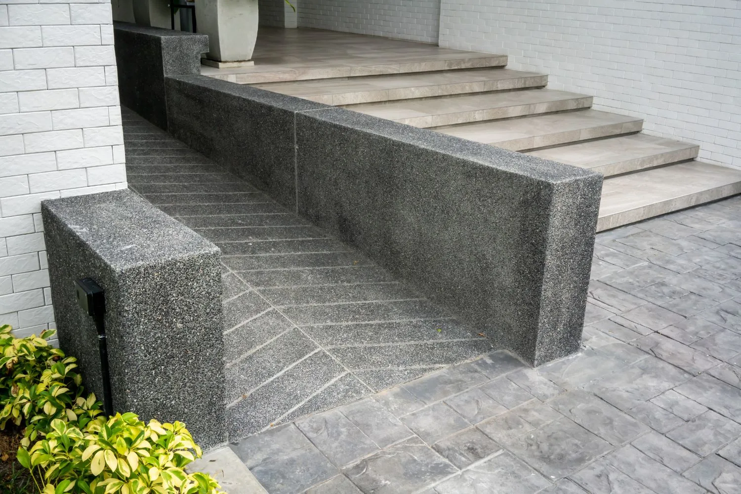 A concrete ramp providing practical access